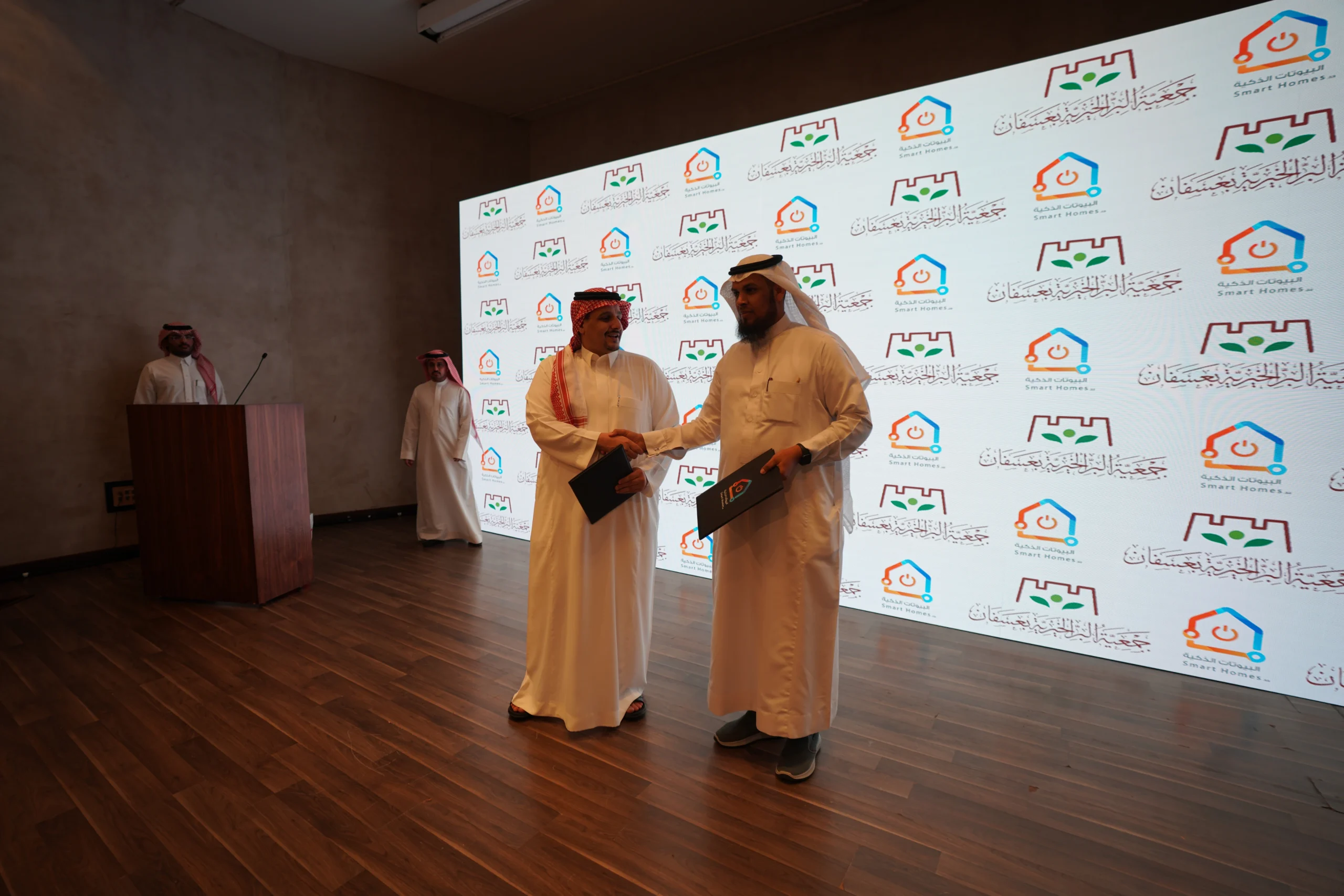 Smart Homes representatives at a partnership event